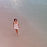 FROM THE NATION OF LOVE: Feel alive and let that feeling sweep you away with the perfect pop of ‘For the Love’ from the sultry pop beauty ‘Willow Woodward’ as she steps onto an exotic beach location.